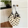 Bolso de axila de nicho de alta gama para mujer, bolso tipo cubo con estampado de lunares nuevo 2026, bolso de hombro de gran capacidad