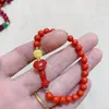 Pulsera de cinabrio natural para mujer, pulsera de cera de abeja, arena roja, ruyi, joyería retro nueva china, este año de vida, transferencia, venta al por mayor, directo