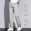 Pantalones casuales de seda italiana de alta gama antiarrugas 2026 verano finos holgados rectos para hombre pantalones de vestir