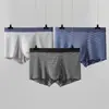 Nuevo en stock: Ropa interior de hombre a rayas de modal de alta calidad, bóxers de tiro medio, estilo popular sin costuras