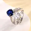 2024 nuevo Huabi joyería cobre chapado en oro simulación color tesoro corindón cuadrado gordo piedra de dos colores anillo de temperamento femenino 8*8