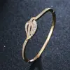 AliExpress deseo Amazon circón microincrustado material de cobre chapado en oro de 18 quilates conjunto de anillo de pulsera Accesorios Al por mayor