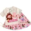 Conjunto de Verano para Niñas 2026 Nuevo Elegante Infantil Verano Delgado Dulce Dibujos Animados Manga Corta Falda Plisada Conjunto de Dos Piezas