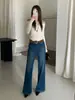 Jeans acampanados de otoño TOP estilo europeo de Guangzhou Trece Líneas vintage de alta resistencia con pliegues elásticos 360 grados con cinturón 61828
