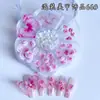 Caja de Flor de Ciruelo con Lazos de Perla, Flores de Dibujos Animados, Pedrería Mixta para Uñas, Decoraciones Brillantes para Uñas, Decoraciones Mixtas al por Mayor