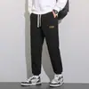 Pantalones casuales de pana para hombre, nuevo estilo otoño 2025, pantalones jogger versátiles para primavera y otoño, pantalones deportivos para hombre con cintura elástica