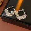 Pendientes Cuadrados de Hoja con Baño de Oro Real en Plata Aguja Pendientes Estilo Fresco Elegante Europeo y Americano Pendientes de Nicho de Gama Alta Venta al por Mayor