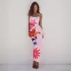 Ropa de Mujer Estilo Europeo y Americano Transfronteriza Verano 2026 Nuevo Vestido Sexy de Tirantes Estampado Estilo Vacaciones para Mujer Vestido de Playa