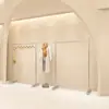 Tienda de ropa moderna simple soporte de exhibición especial de acero inoxidable para piso estante de exhibición de perchas para tienda de ropa de hombre y mujer