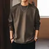 Nueva camiseta retro de manga larga con cuello redondo de alta gama para hombre, marca de tendencia de primavera, color liso, simple, corte holgado, camiseta básica para hombre