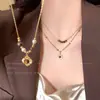 Coleção Outono/Inverno: Colar de girassol com olho de tigre estilo Maillard, uma peça retrô e versátil estilo Hong Kong que adiciona elegância, com um design de camada dupla para um look chique na clavícula.