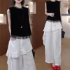 Look de dos piezas de verano 2026 Pantalones de pierna ancha asimétricos de cintura alta con volantes para mujer, Pantalones cortos ligeros casuales adelgazantes acortados