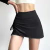 Falda corta deportiva con cordón para mujer, de dos piezas falsas, anti-exposición, para correr, fitness, yoga, de cintura alta, adelgazante, sexy, midi, bodycon