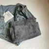Bolsa de veludo de grande capacidade, nova bolsa de ombro casual outono e inverno 2026, bolsa tote única e simples para aula e trajeto