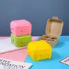 Caja de huevos de 4 compartimentos caja de almacenamiento de esponjas de maquillaje caja para polveras base de maquillaje huevo de maquillaje caja de embalaje de herramienta de esponja de plástico