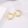 Exclusivo transfronterizo para Europa y Estados Unidos nuevos aretes aro liso largos sensación de alta gama diario minoría hebilla de oreja anillo de oreja de personalidad de moda
