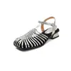 Sandalias romanas tejidas huecas británicas de comercio exterior transfronterizo para mujer, estilo vacacional de verano 2026, zapatos casuales de nicho de punta cerrada tipo jaula de cerdo