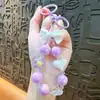 Llavero Creativo Color Caramelo Fresco Chapado con Cuentas Llavero de Moño Corazón Colgante Pequeño para Bolsa Mayoreo