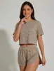 Pijama de Punto Rayado Otoño 2026 Europeo y Americano Conjunto de Shorts de Manga Corta Holgados Ropa de Casa de Moda Transfronteriza para Mujer
