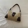 Bolso bandolera de hombro de gran capacidad con remaches retro para mujer 2026 Bolso tote Melard con diseño de hebilla nuevo al por mayor