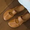 Un paso en el talón cabeza de bolsa arrastre medio estilo perezoso de mujer 2026 nueva moda retro francés sandalias chanclas mula exterior hueco
