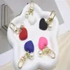 Lindo Colgante Llavero Corazón de Resina Multicolor Perla Versátil Femenino Colgante Corazón de Durazno Accesorio para Bolso Teléfono