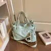 Bolsa de lona de grande capacidade para mulheres, novo modelo de outono 2026, adequada para escola e trabalho, bolsa tote, bolsa de ombro e transversal de grande capacidade