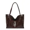 Bolso de hombro 2026 nuevo, moderno, de color liso, elegante, lindo, simple, versátil y casual con gran capacidad, un bolso retro para mujer