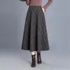 Falda retro de cuadros línea A para mujer, nueva colección otoño 2026, de cintura alta, que cubre la cadera, casual, adelgazante y acampanada.