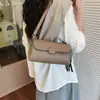 Bolsa Transversal Casual Nicho Feminina de Ombro Novo Estilo Versátil para o Dia a Dia Tendência Design de Moda Verão 2026