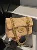 Bolsa acolchoada com corrente estilo retrô transfronteiriça, bolsa de ombro moderna e minimalista, bolsa de mão de design de nicho estilo coreano para mulheres
