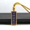 Venta al por mayor del fabricante Arena Mineral Pintada a Mano Acero de Titanio Thangka Zaki Lamu Amarillo Riqueza Mineral Pequeño Thangka Portátil Buda Amuleto Colgante Collar