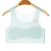 Roupa íntima sem costura para meninas em fase de desenvolvimento em estoque, Roupa íntima fina com copas fixas anti-amassados para meninas do ensino fundamental, Camiseta regata para meninas do ensino médio