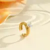 Anillo de Acero Inoxidable con Circonita Incrustada Estilo de Moda Transfronterizo Chapado en Oro de 18K Lujo Accesible Anillo de Acero de Titanio Joyería de Mano Ajustable