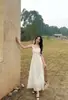 Vestido de Suspensório Primavera e Verão 2026 Novo Vestido Azul com Bordas Franzidas, Vestido de Férias Estilo Francês