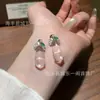 Venta al por mayor del fabricante Xiaohongshu Colgante Natural de Espuma de Agua con Frijol de Jade Incrustado en Plata S925, Diseño Fresco y Delicado