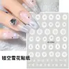 Pegatinas de Uñas Navideñas de Copo de Nieve Hueco al por Mayor Pequeño Libro Rojo Navidad Copo de Nieve Blanco Decoración de Uñas Portátil Pegatinas para Uñas