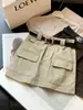 Falda de mujer dulce y fresca estilo workwear, nuevo diseño de otoño con bolsillos, de cintura alta, línea A, anti-exposición, falda corta ajustada