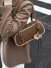 Bolso tipo almohada transfronterizo simple y moderno para mujer, bolso de hombro retro de color contrastante para otoño e invierno, bolso de hombro para commuting, bolso de alta gama