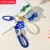 Mini Ramo Nuevo Día del Maestro con Cadena de Perlas y Llavero de Doble Cuerda, Crochet Hecho a Mano, Regalo para Maestros en el Día del Maestro