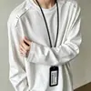 Marca de moda americana Diseño metálico Sentido del diseño Color sólido Manga larga Camiseta Hombre Otoño Corte limpio Sudadera con capucha Peso pesado Sencillo Superior