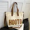 Bolso de mano versátil simple estilo coreano para estudiantes Bolso de hombro único de lona moda coreana Bolso de lona con estampado de letras