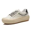 Zapatillas blancas de piel auténtica con patrón de espiga para mujer, nuevo modelo otoño 2026, zapatos versátiles para mujer, zapatillas planas, zapatillas deportivas de moda para mujer