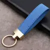 Llaveros de coche de gamuza multicolor, colgantes creativos de acero inoxidable para hombres y mujeres, pequeños regalos, llaveros de coche con cordones