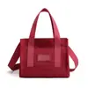 Bolsa de tela de nailon ligera 2023 Nueva llegada de primavera Bolso cruzado para mujer Fresco Dulce Mini bolso cuadrado Bolso de mano de un solo hombro