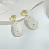 Pendientes de botón de plata 925 de alta calidad, exquisitos, con diseño único en forma de gota de agua y esmalte nacarado, estilo europeo y americano, para mujer, disponibles para dropshipping