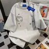 Camiseta de manga corta 100% algodón, estilo coreano vintage, para mujer, nuevo modelo de verano, corte holgado, adelgazante, estilo casual, cuello redondo, prenda para pareja