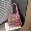 Bolso de Punto Calado de Diseño de Nicho para Mujer 2026 Nuevo Verano Estilo Coreano Versátil Bolso Tejido Hecho a Mano Bolso de Cubo de Mano