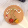 Llavero Lindo Estilo Coreano Flor de Calabaza Brote Flor de Calabaza Colgante de Cuentas Encanto de Bolsa Regalo para Pareja Estudiante Adorno Colgante de Hilo Lindo Crochet