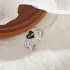 Anillo de aleación negro nuevo estilo 2023 amor epoxi diseño de nicho anillo sentido del temperamento anillo estilo frío simple